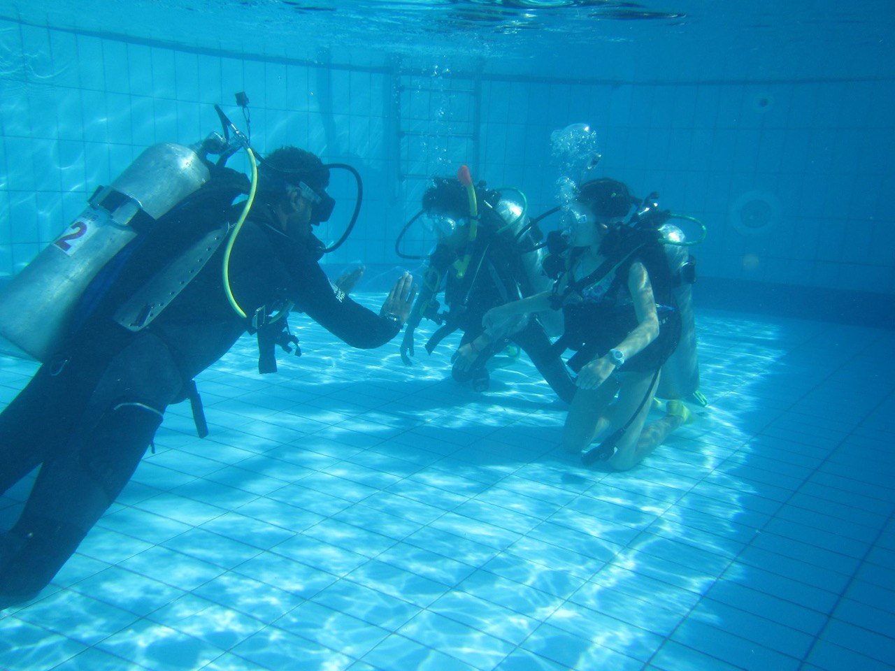 Student diver training with instructor